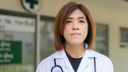 Transgender non binary doctor with stethoscope