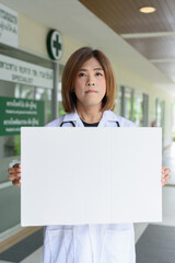 Transgender non binary doctor with stethoscope