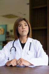 Transgender non binary doctor with stethoscope