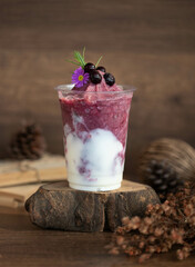 Berry Yogurt Frappé is a blended drink made with yogurt and berries, topped with fresh blueberries...