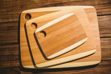 Chopping boards on wooden floor