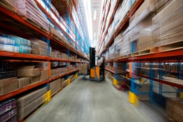 Fototapeta premium Fork lift truck in warehouse