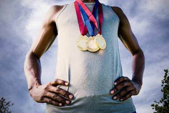 Fototapeta Low angle view of medalist against sky