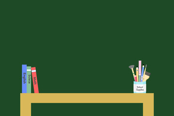 Back to School Essentials Flat Lay on a Green Background