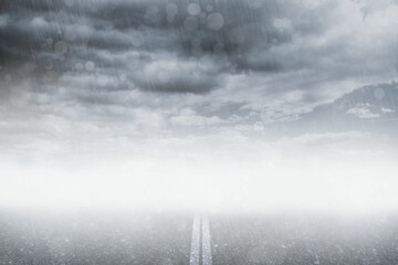 Empty wet road stretching into dense fog in flat design, with double white center line