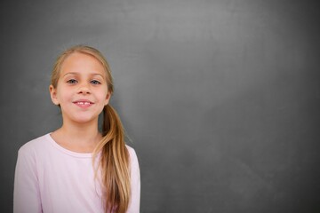 Cute pupil with chalkboard