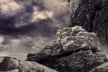 Rock crashing down from cliff