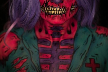 Attractive young woman with Halloween makeup