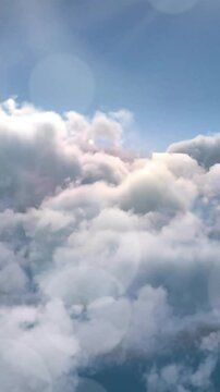Animation of gray sculpture of man over blue sky and clouds, copy space