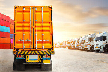 Semi Trailer Trucks Parked on The Parking Lot at The Port. Warehouse Port. Shipping Cargo Container. Economy Business Transport on Road. Shipping Import- Export. Trucking. Freight Logistics Transport	