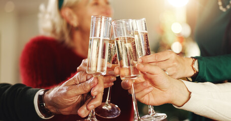 People, hands and cheers with champagne glasses for thanksgiving, toast or celebration together. Closeup, group or alcohol with drink or memory for new year event, festive holiday or Christmas party