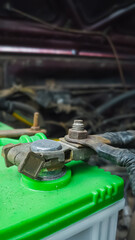 Closeup of Corroded Car Battery Terminal and Cable Connections