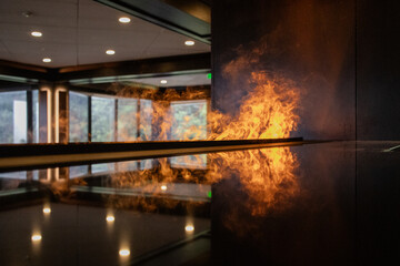 Reflective fire feature inside an elegant room