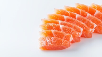 Fresh salmon sashimi slices are neatly arranged in a row on a pristine white background, exhibiting their vibrant color and enticing texture in the studio shot.