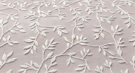 Delicate white leaf and branch pattern on a sheer fabric, creating a subtle and elegant background