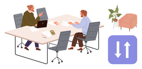 Two colleagues engaged in discussion at a desk with laptops, notebooks, and chairs. Surrounding decor includes potted plants and furniture. Ideal for teamwork, collaboration, office life