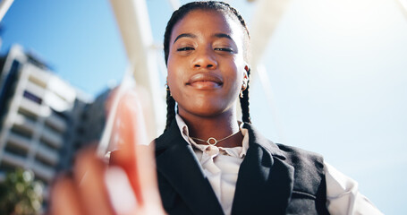 Business woman, smile and selfie outdoor with point, low angle and post on web with commute to...