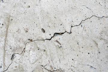 One big crack in diagonal on a concrete wall