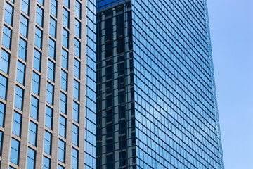 A cityscape of moving cloud reflecting the office building at the business town