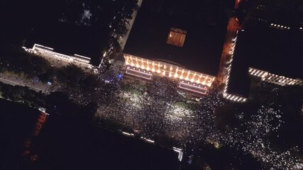 Tbilisi, Georgia - 28th october, 2024: aerial top view georgian people in street by parliament in anti-government post elections protests in capital Tbilisi. Rustaveli avenue. Pro european protests