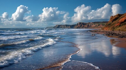 Waves crash on Cayton shore