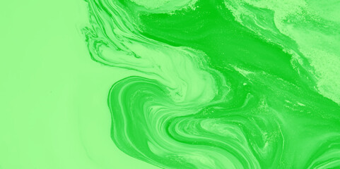 Highlights a rich interplay of colors and textures, with the soft green hues, Golden veins and flecks weave through the design adding a striking, wave lines creating a sense of depth and movement.