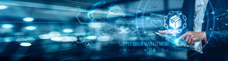 A businessman using a tablet is analyzing supply chain management by tracking key KPIs such as...