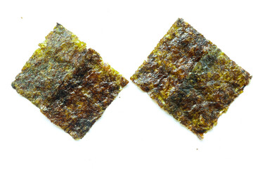 nori seaweed isolated on white background. Japanese food nori. Dry seaweed sheets.