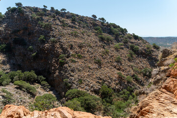 Exploring the unique landscape of Milatos Cave in Crete, Greece during a sunny day