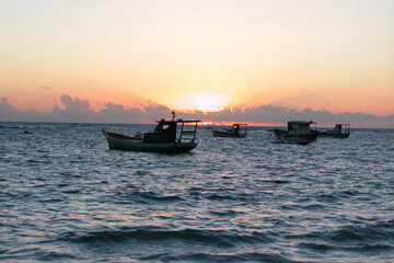 Fototapeta premium Boats on the water at sunset
