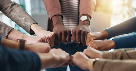 Hands, people and fist together in office for team building, solidarity and trust with motivation....