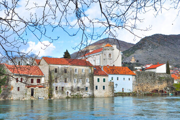 Historical buildings on the riverside in Trebinje, Bosnia and Herzegovina. Stone houses by the...