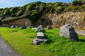 Scenic Grassy Area with Rocks and Greenery
