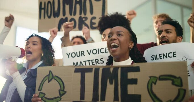 Woman, poster and group with protest for climate change, solidarity and voice for sustainability. People, speaker and crowd chant with sign for ecology crisis with power, support and global warming