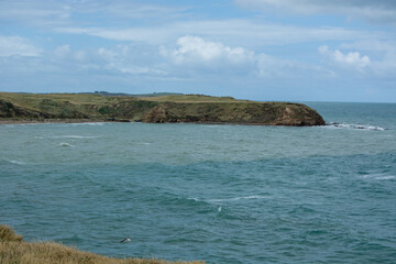 Tranquil Coastal Landscape with Rocky Shoreline