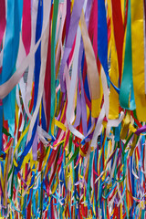Colorful Hanging Ribbons as Festive Outdoor Decoration