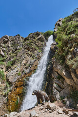 Bear Waterfall in Turgen Gorge with Rock Bear Sculpture, Kazakhstan