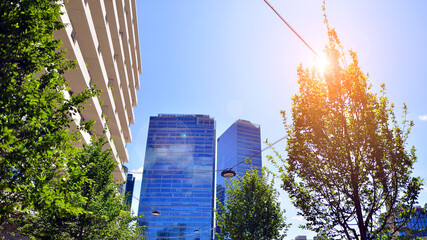 Office with green environment. Corporate building reduce CO2. Sustainable glass office building...