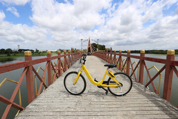 Bicycle on road in the garden at city park