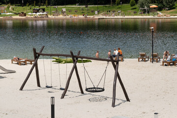 Relaxing on a sandy beach on a lake - Stavropol, Russia, July 3, 2025