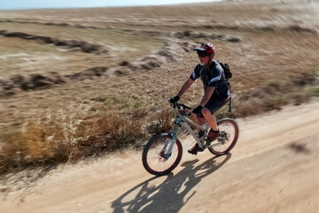 Cyclist Riding the Mountain Bike
