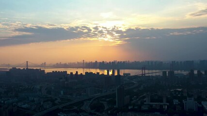 Breathtaking sunset over Wuhan City captured in stunning aerial view during golden hour