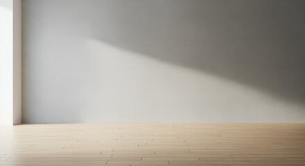 Sunlit minimalist interior with a textured wall and parquet wooden floor space