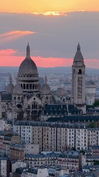 Experience the Stunning Views of the Basilica at Dusk Over the Romantic City of Paris. Vertical video