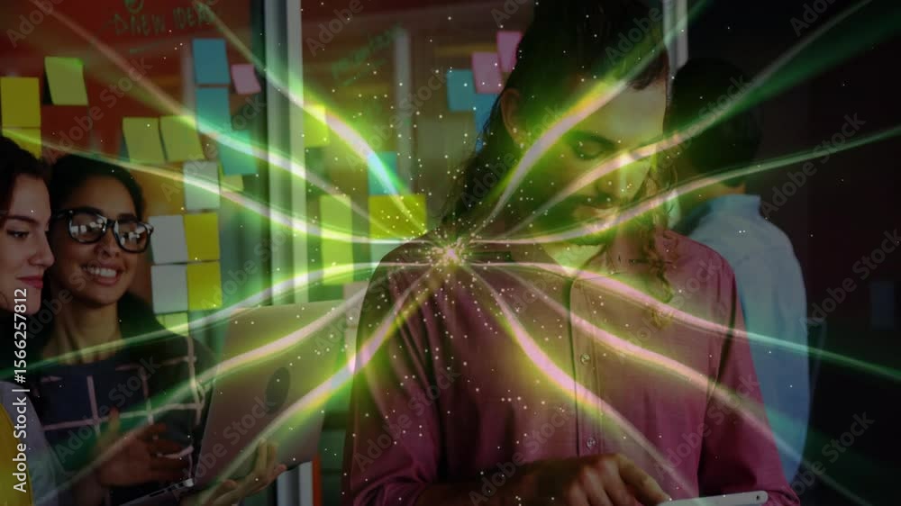 Poster man tapping tablet in tech office sending glowing data burst animating sticky notes for teamwork