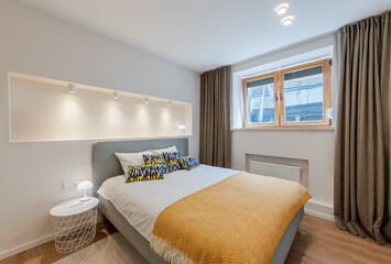 Modern Bedroom With Cozy Interior Decoration and Wooden Window