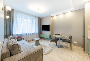 Modern Home Living Room with Stylish Furniture and Sofa, TV Screen, Dining Table