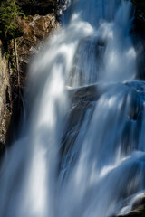 Part of the Krimml Waterfalls cascade with water movement captured
