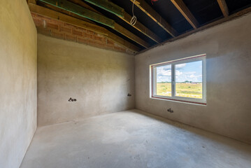 Unfinished Residential Room With Large Windows Overlooking Scenic Countryside