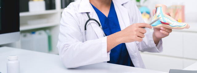The doctor in orthopedics held a detailed and consultation at the hospital, guiding the patient...